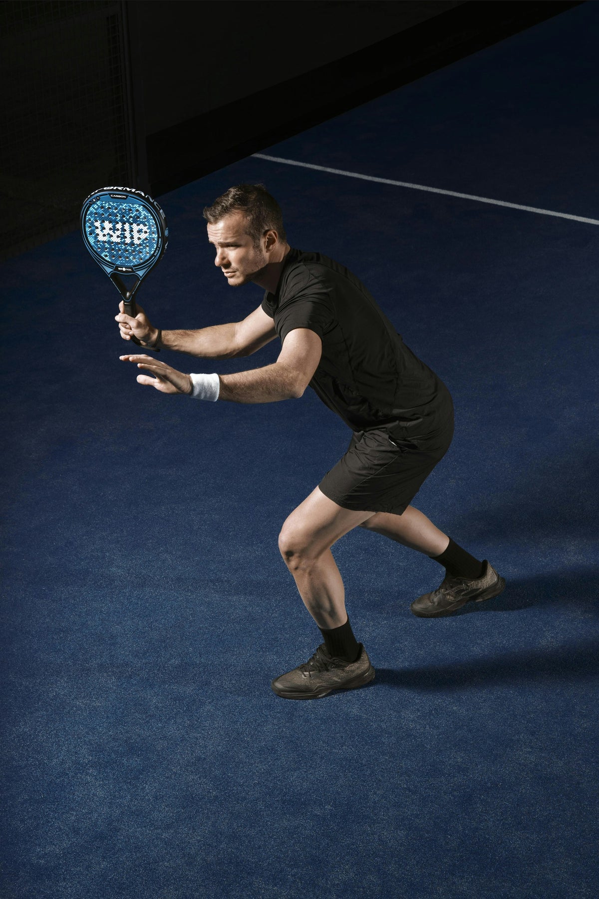 Padel player on court